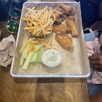 Local No 7 - Lemon pepper wings with a side of fries. - American Near Me - Tucker, Georgia