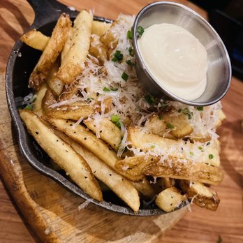 The Wilcox Gastropub - Truffle Fries | v gf Truffle Oil, Padano Cheese, Chives, Fries - Gastropubs Near Me - Mississauga, Ontario The Wilcox Gastropub - Truffle Fries | v gf Truffle Oil, Padano Cheese, Chives, Fries - Gastropubs Near Me - Mississauga, Ontario