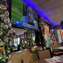 Lots of decorations and televisions everywhere