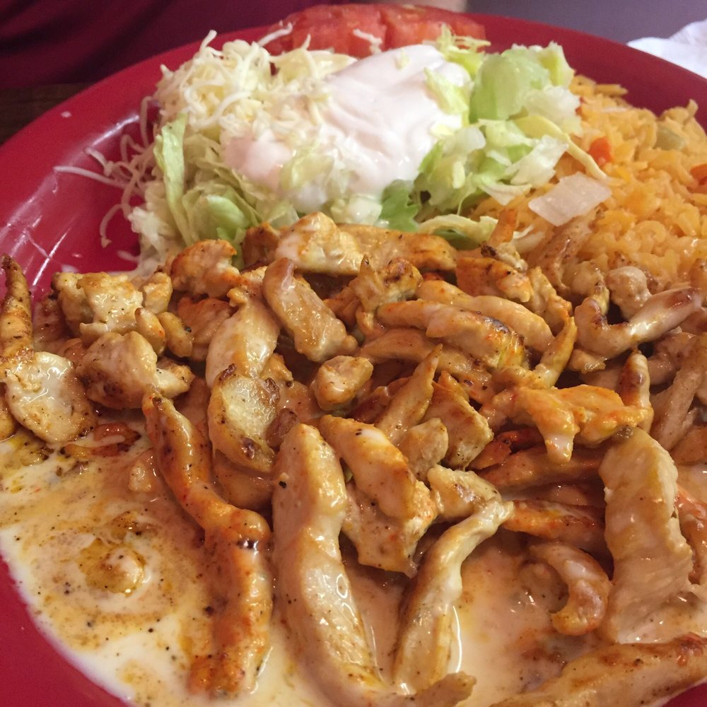 El Gallo Mexican Restaurant - Arroz con pollo - marinated chicken with a cheesy crema, rice and tortillas - Mexican Near Me - Sutton, West Virginia El Gallo Mexican Restaurant - Arroz con pollo - marinated chicken with a cheesy crema, rice and tortillas - Mexican Near Me - Sutton, West Virginia