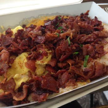 Biscuit Bitch - The cheesy grits one? Add bacon, of course. - Breakfast & Brunch Near Me - Seattle, Washington