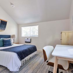 Home Sweet Host - Enjoy this serene and stylish minimalist bedroom