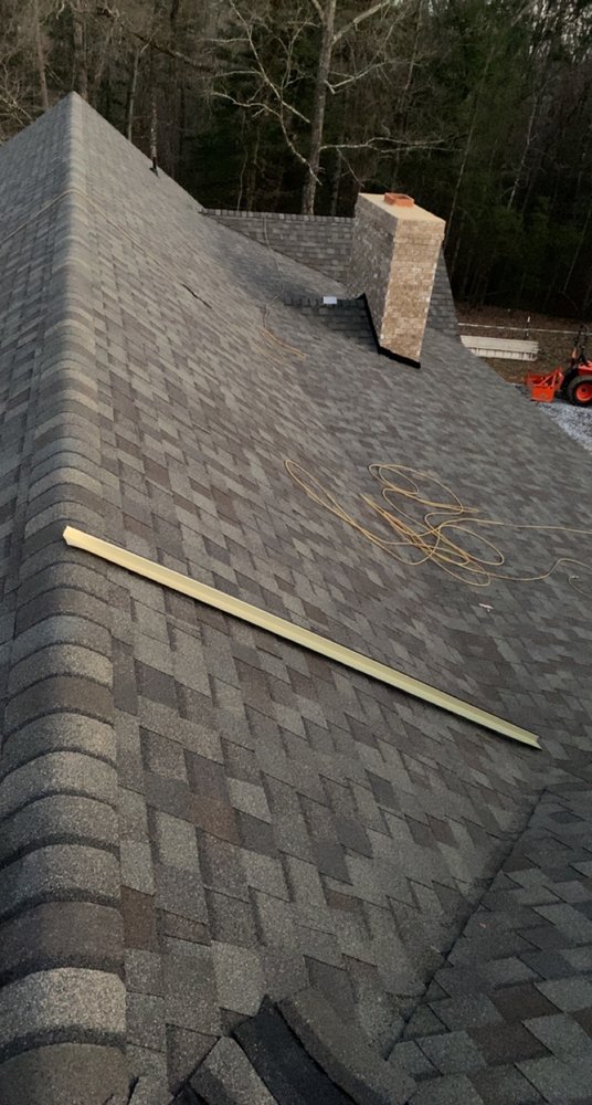 Slide of T & M Roofing