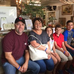 Upcycle Boutique VA - Tracy and her fabulous family bought the handcrafted poplar bench they are seated on.