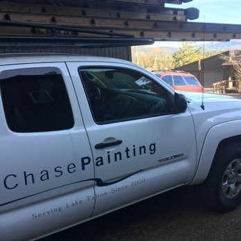 Chase Painting - a white truck parked in front of a building - Painters Near Me - Truckee, California Chase Painting - a white truck parked in front of a building - Painters Near Me - Truckee, California