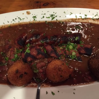 Buzzard Billy's - Red Beans & Rice with Andouille Sausage & homemade hushpuppies. - Cajun/Creole Near Me - Des Moines, Iowa Buzzard Billy's - Red Beans & Rice with Andouille Sausage & homemade hushpuppies. - Cajun/Creole Near Me - Des Moines, Iowa
