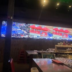 Shoeless Joe's Sports Grill - Hamilton - Big screen TVs by the Bar