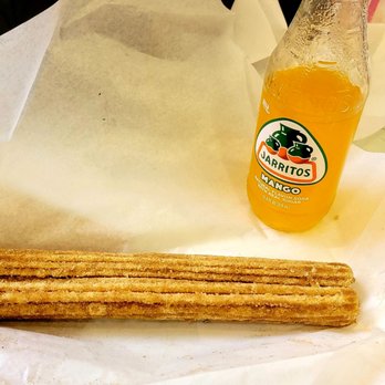 Taquiza - a bottle of orange juice and a biscuit - Tacos Near Me - Silverdale, Washington Taquiza - a bottle of orange juice and a biscuit - Tacos Near Me - Silverdale, Washington