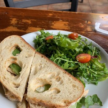 Tournesol Cafe and Bakery - Chicken salad sandwich with arugula salad - Bakeries Near Me - Covington, Louisiana Tournesol Cafe and Bakery - Chicken salad sandwich with arugula salad - Bakeries Near Me - Covington, Louisiana