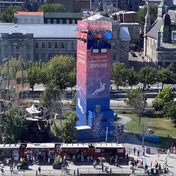 MTL Zipline - Photo taken from La Grande Roue de Mont (Ferris Wheel) - Ziplining Near Me - Montreal, Quebec MTL Zipline - Photo taken from La Grande Roue de Mont (Ferris Wheel) - Ziplining Near Me - Montreal, Quebec