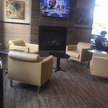 City Brew Coffee - two people sitting in chairs in front of a fireplace - Coffee & Tea Near Me - Billings, Montana City Brew Coffee - two people sitting in chairs in front of a fireplace - Coffee & Tea Near Me - Billings, Montana