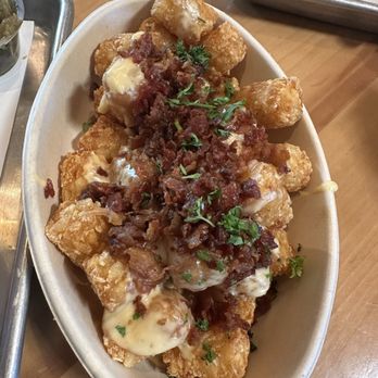 Frenchie's Dips and Tots - Loaded Tots with bacon and que so. YUM!! (They also come with green chili peppers. We got those on the side) - Sandwiches Near Me - Albuquerque, New Mexico Frenchie's Dips and Tots - Loaded Tots with bacon and que so. YUM!! (They also come with green chili peppers. We got those on the side) - Sandwiches Near Me - Albuquerque, New Mexico