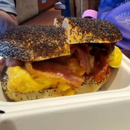 Bacon, egg and cheese on a poppy bagel
