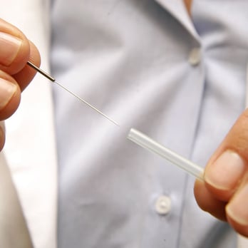 Gainesville Holistic Healthcare - Doctor displaying acupuncture needle. - Acupuncture Near Me - Gainesville, Florida Gainesville Holistic Healthcare - Doctor displaying acupuncture needle. - Acupuncture Near Me - Gainesville, Florida