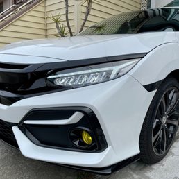 After market headlights installed at Gosch bros.