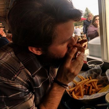 Bob's Clam Hut - Hubs digging into his first ever lobster roll - Seafood Near Me - Kittery, Maine