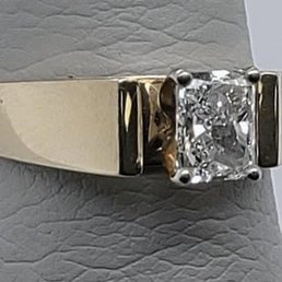 Engagement ring with a radiant cut center stone. Engagement ring with a radiant cut center stone.