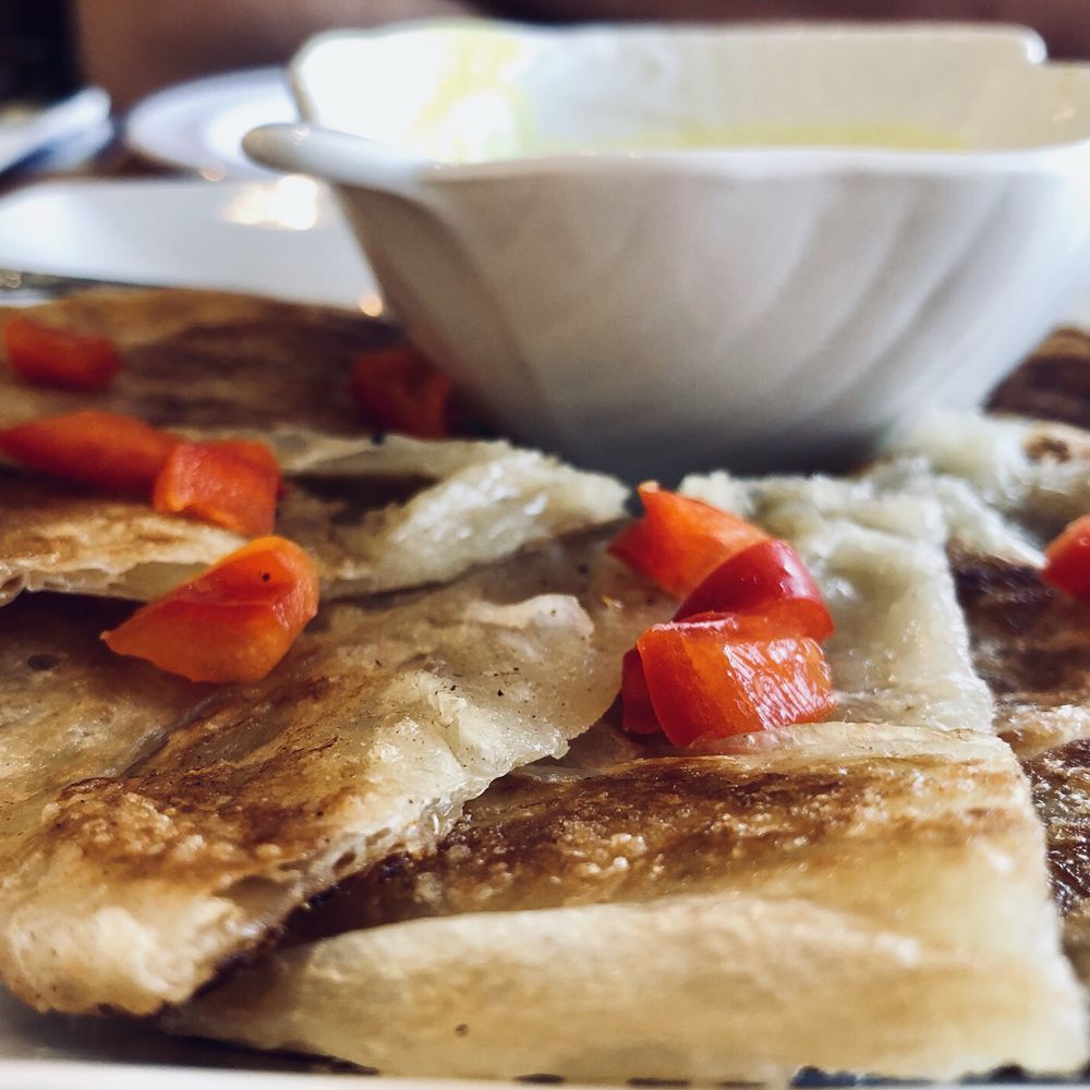 Pikul Thai Bistro - Roti with yellow curry sauce - Thai Near Me - Fairfield, California Pikul Thai Bistro - Roti with yellow curry sauce - Thai Near Me - Fairfield, California