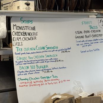 Dylan’s Pizza - Wonderful menu for extras - A whiteboard displays menu items including soups, tacos, and sandwiches, with prices and descriptions, in a food service setting. - Pizza Near Me - Hull, Massachusetts