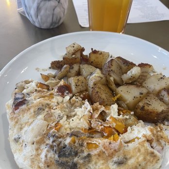 The Breakfast Den - I opened up my egg white omelette to show the yummy butternut squash (among other veggies I choose). - Breakfast & Brunch Near Me - Philadelphia, Pennsylvania The Breakfast Den - I opened up my egg white omelette to show the yummy butternut squash (among other veggies I choose). - Breakfast & Brunch Near Me - Philadelphia, Pennsylvania