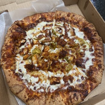 Paisano's Pizza Grill - Holy City Hot Specialty pizza. Sweet Baby Ray's hot base with mozzarella cheese, fried chicken, pickles and ranch. Red onion ommited. - Pizza Near Me - Charleston, South Carolina