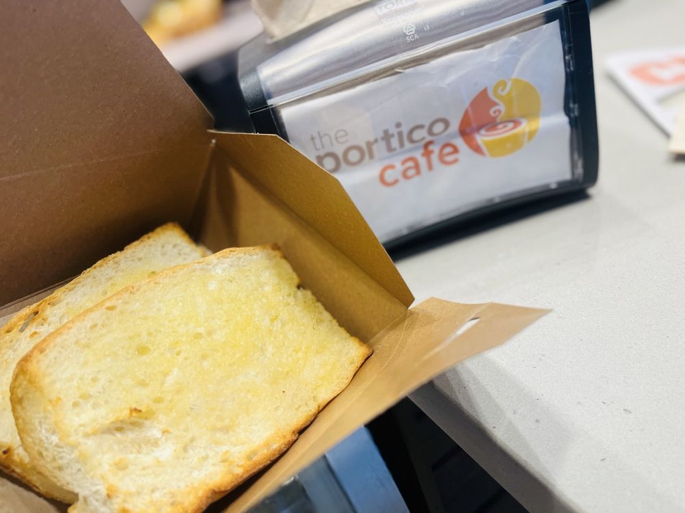 The Portico Cafe Logo