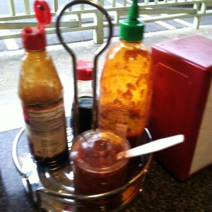 Photo of Pho King Delicious - Northridge, CA, United States. Disgusting on every table!!! Everything is sticky and unsanitary