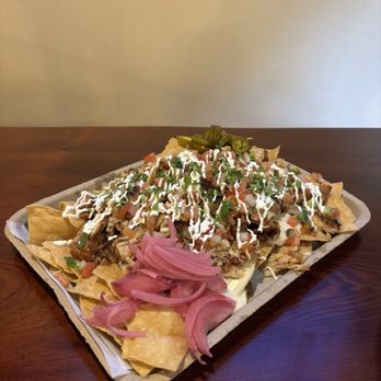 Big Sur Taphouse - Grande Nachos with Chicken - Pubs Near Me - Big Sur, California Big Sur Taphouse - Grande Nachos with Chicken - Pubs Near Me - Big Sur, California