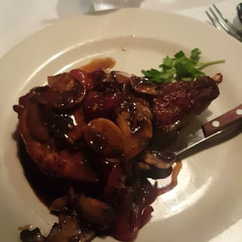 Laico's - Pork Chop with Vinegar Peppers and Mushrooms - Italian Near Me - Jersey City, New Jersey Laico's - Pork Chop with Vinegar Peppers and Mushrooms - Italian Near Me - Jersey City, New Jersey