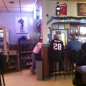 West York Inn - a bar with people sitting at the bar - Lounges Near Me - York, Pennsylvania West York Inn - a bar with people sitting at the bar - Lounges Near Me - York, Pennsylvania