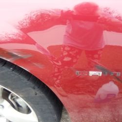 Deloach Body Works - Damage to left front wheel well, and damage to rim. 2010 Camaro. He hite me with his right front tire.