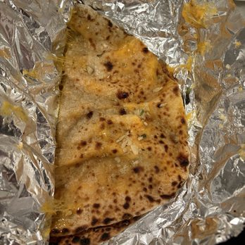 Coriander - Garlic Cheese Naan - Vegan Near Me - Golden, Colorado Coriander - Garlic Cheese Naan - Vegan Near Me - Golden, Colorado