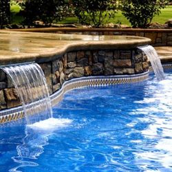 Blue Lagoon Pools - swiming pool install with water feature