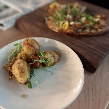 Bourbon & Boards - Curry fried potatoes and flatbread in background. - Bars Near Me - St. Augustine, Florida