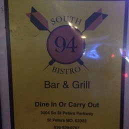 a sign for a bar and grill a sign for a bar and grill