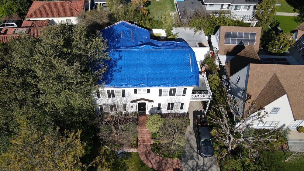 Slide of Rafael and Iris Roofing