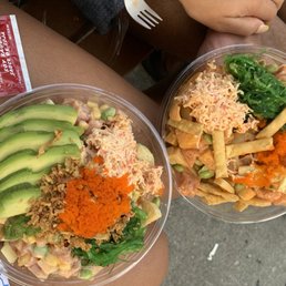 2 poke bowls, 3 scoops of fish each. One brown rice, one white and lots of toppings! 2 poke bowls, 3 scoops of fish each. One brown rice, one white and lots of toppings!