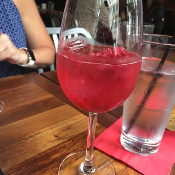 Von's 1000 Spirits - Summer Sparker cocktail with sparkling wine, lemon, and berries - New American Near Me - Seattle, Washington Von's 1000 Spirits - Summer Sparker cocktail with sparkling wine, lemon, and berries - New American Near Me - Seattle, Washington