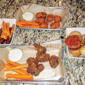 AWSOM Wings - Alhambra - variety of wings and cheese balls. Bottom wings are the spicy concoction they made for me. - Chicken Wings Near Me - Alhambra, California AWSOM Wings - Alhambra - variety of wings and cheese balls. Bottom wings are the spicy concoction they made for me. - Chicken Wings Near Me - Alhambra, California