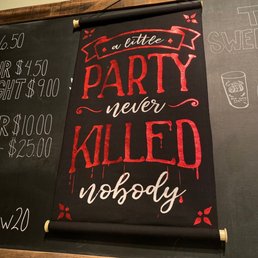 a blackboard with a sign that says party never killed nobody a blackboard with a sign that says party never killed nobody