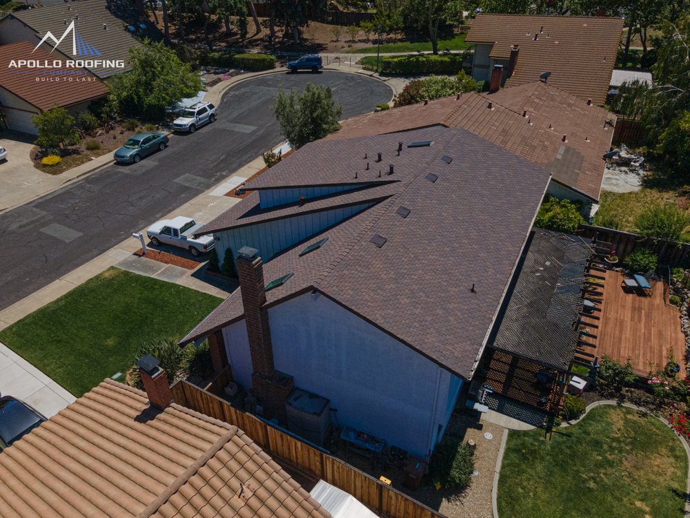 Slide of Apollo Roofing Company