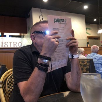 Kathryn's - Brother Steve examines the menu. - American Near Me - Emerald Isle, North Carolina