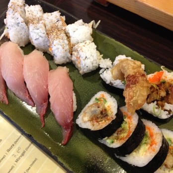 Nao Sushi - The spider (blue crab) and scallop roll with 4 hamachi (yellow tail) sushi. - Japanese Near Me - Burnaby, British Columbia Nao Sushi - The spider (blue crab) and scallop roll with 4 hamachi (yellow tail) sushi. - Japanese Near Me - Burnaby, British Columbia