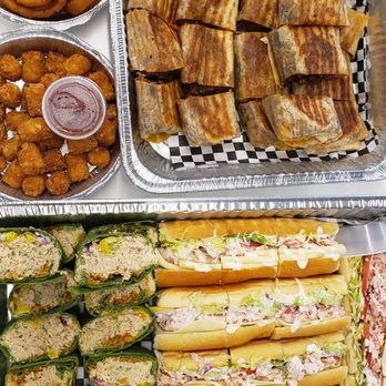 Sandwich Blvd - Catering option: comes with 3 sandwich options and tater tots and onion ring sides - Sandwiches Near Me - Torrance, California Sandwich Blvd - Catering option: comes with 3 sandwich options and tater tots and onion ring sides - Sandwiches Near Me - Torrance, California