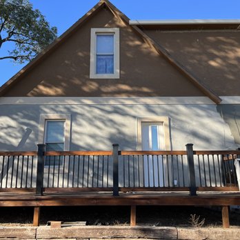 Go 2 Guys & Gals - a house with a deck and a ladder - General Contractors Near Me Go 2 Guys & Gals - a house with a deck and a ladder - General Contractors Near Me