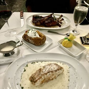 Mastro's Steakhouse - Rack of lamb, sea bass with béarnaise sauce, baked potato - Steakhouses Near Me - Stateline, Nevada Mastro's Steakhouse - Rack of lamb, sea bass with béarnaise sauce, baked potato - Steakhouses Near Me - Stateline, Nevada