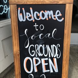 Local Grounds Coffee - Entrance board with hours