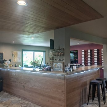 Tucannon Cellars - a bar with stools - Wineries Near Me - Benton City, Washington Tucannon Cellars - a bar with stools - Wineries Near Me - Benton City, Washington