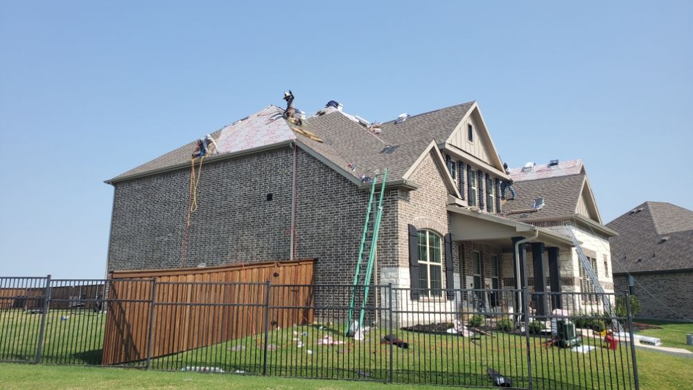 Slide of TLC Roofing and Construction