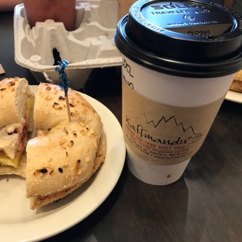 Kaffmandu Coffee House - Danvers - Bacon egg and cheese on an onion bagel, medium hot razzle dazzle mocha - Coffee & Tea Near Me - Danvers, Massachusetts Kaffmandu Coffee House - Danvers - Bacon egg and cheese on an onion bagel, medium hot razzle dazzle mocha - Coffee & Tea Near Me - Danvers, Massachusetts